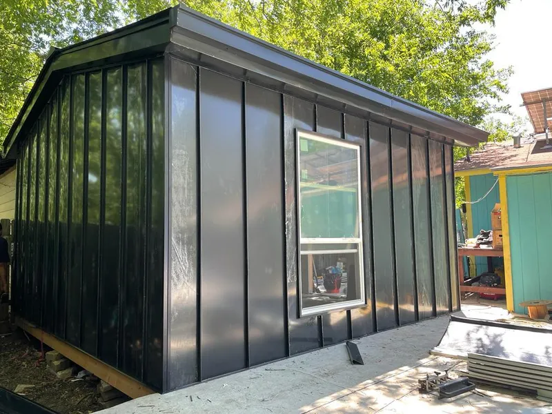Black standing seam metal wall panels for Metal Roof Installation in Port St. John