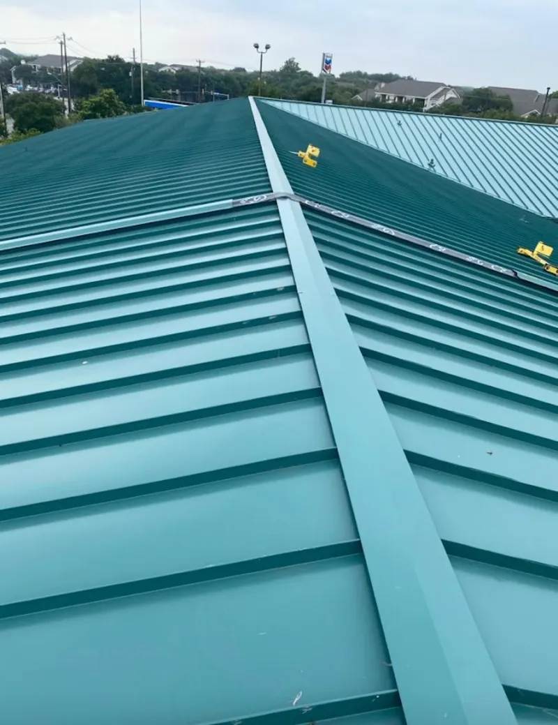 Green commercial metal roof ridge and valley for Metal Roof Repair in Port St. John